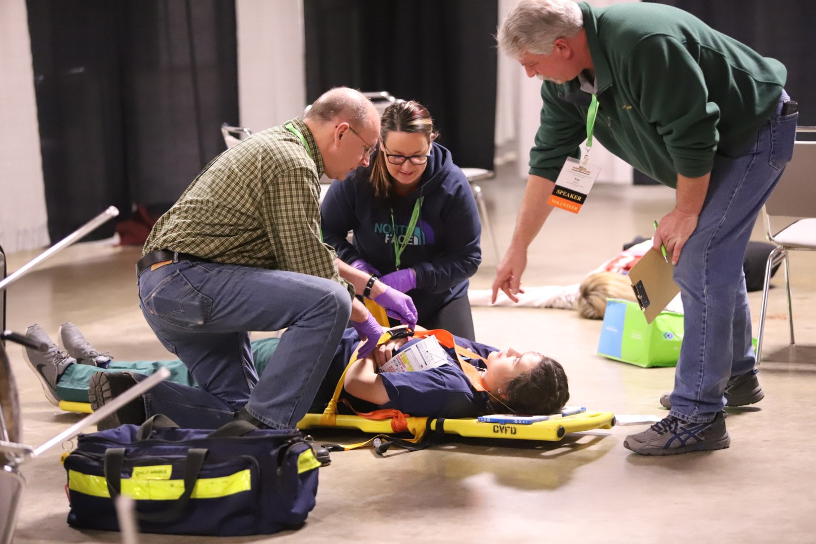 teachers showing how to do various EMS work.