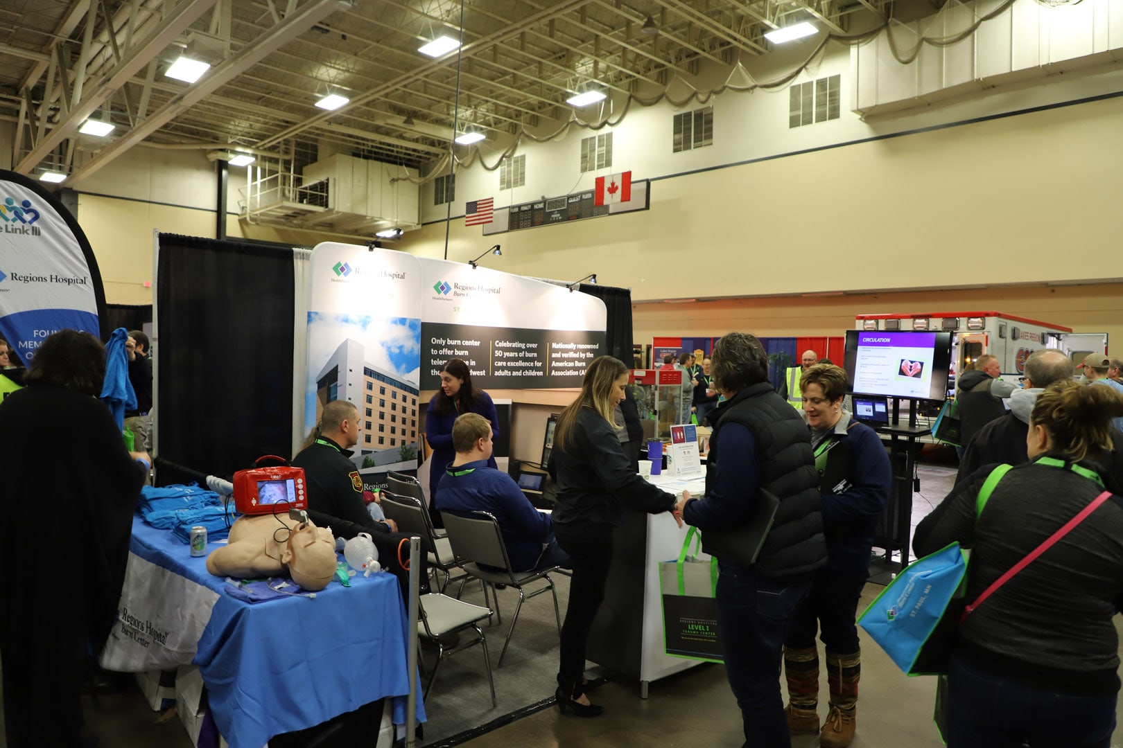 People at the expo visiting booths.